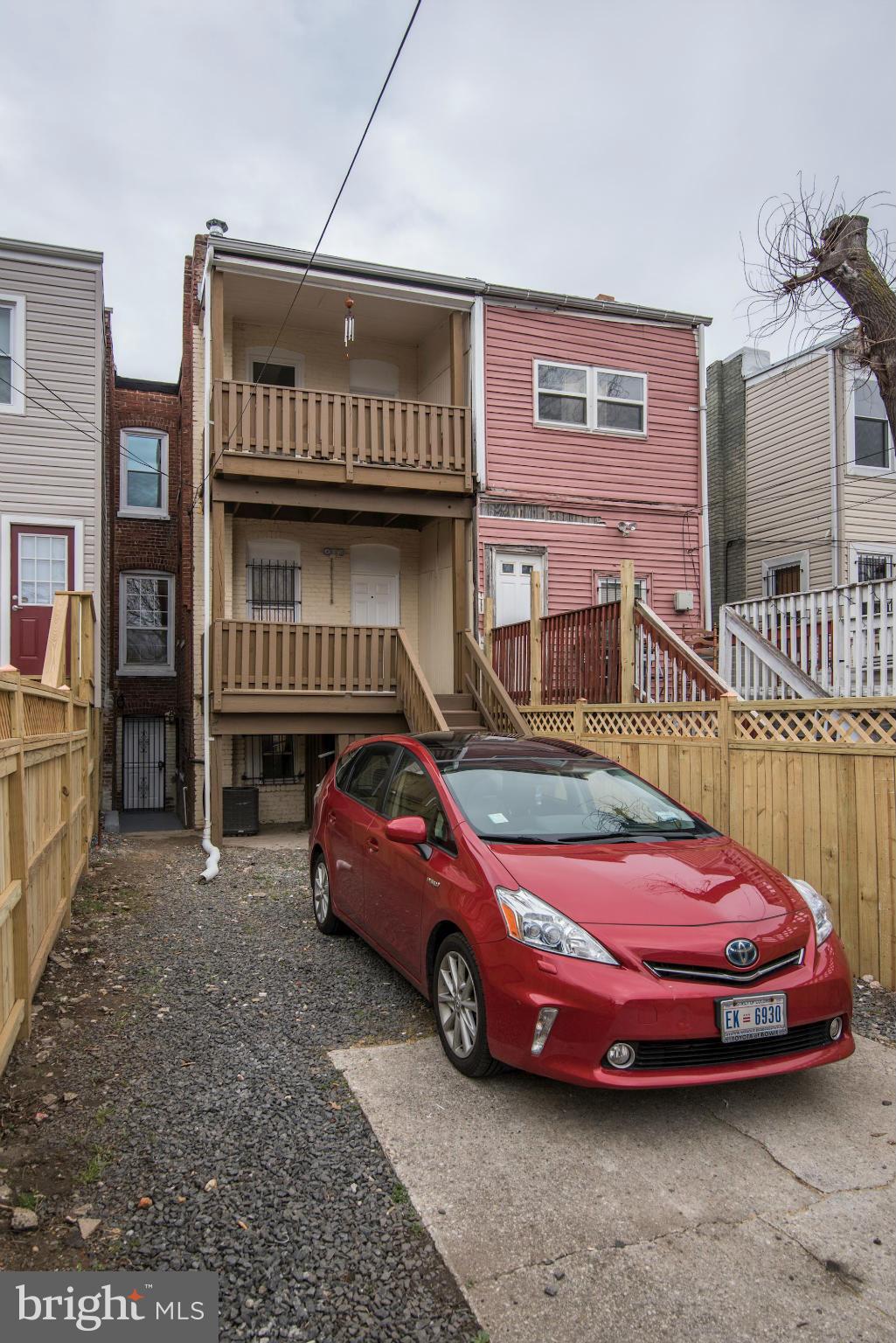 3633 13th Street Northwest Washington, DC 20010 - Photo 29 of 30 a front view of a house with parking space