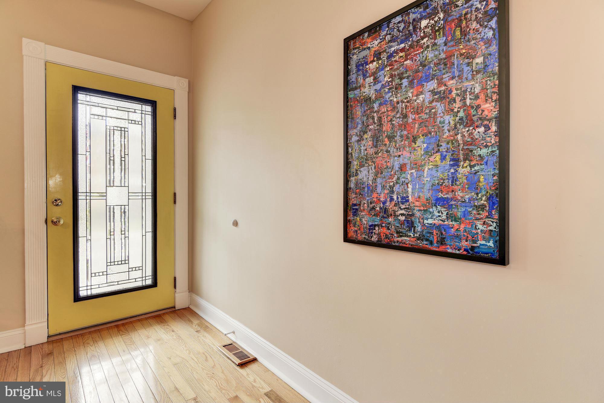 3633 13th Street Northwest Washington, DC 20010 - Photo 4 of 30 an empty room with wooden floor and closet