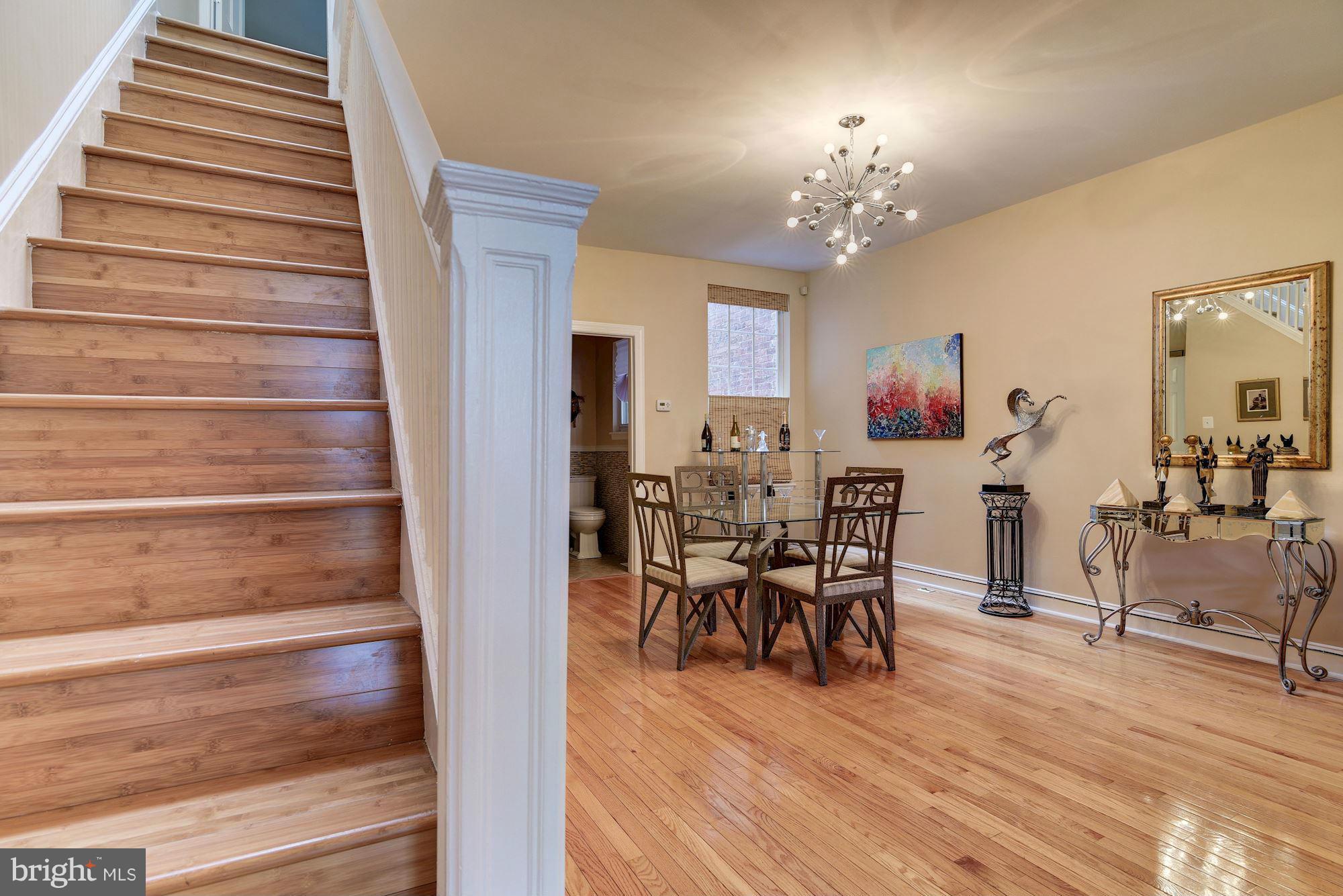 3633 13th Street Northwest Washington, DC 20010 - Photo 5 of 30 a view of a dining room with furniture and wooden floor