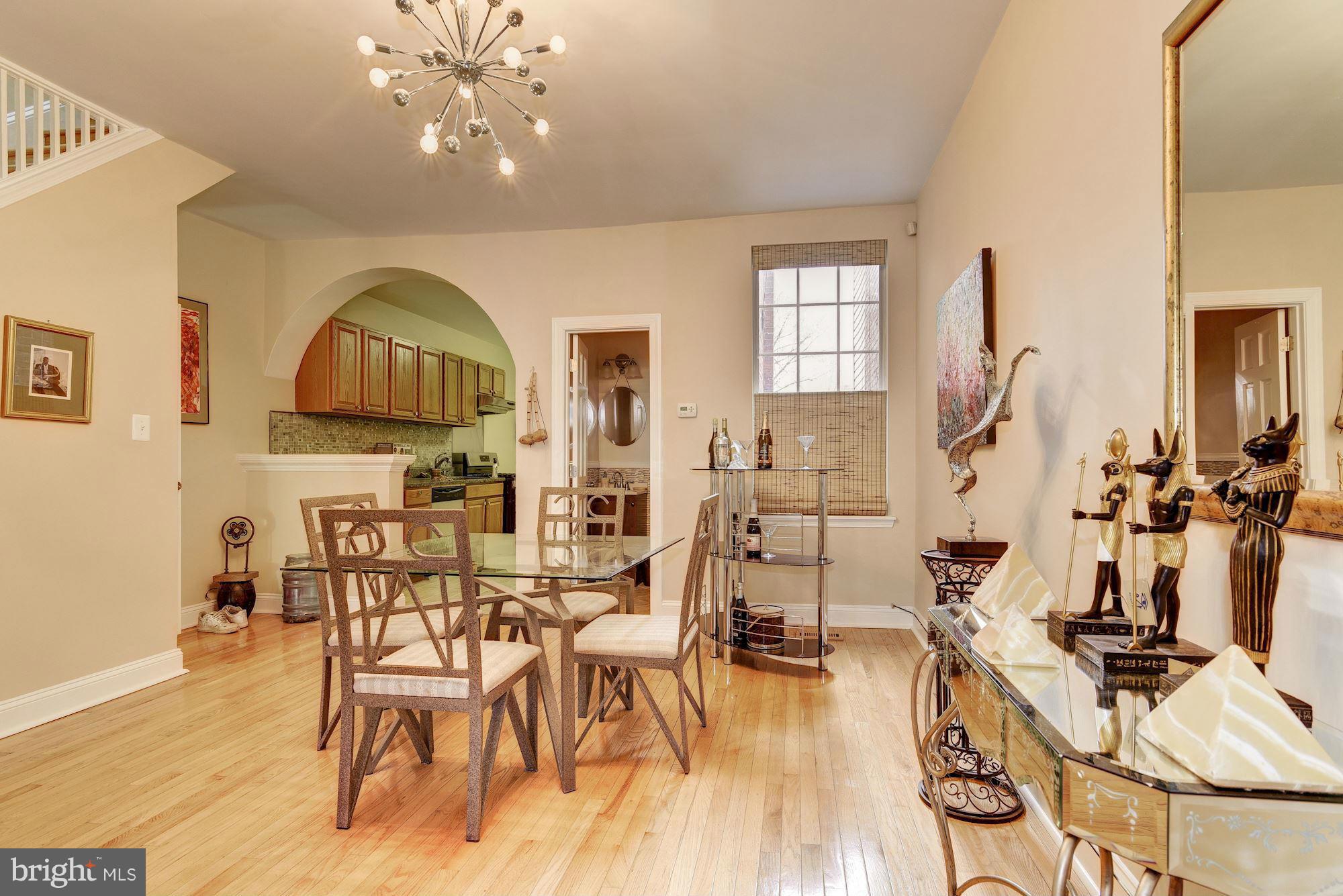 3633 13th Street Northwest Washington, DC 20010 - Photo 9 of 30 a view of a dining room with furniture and wooden floor