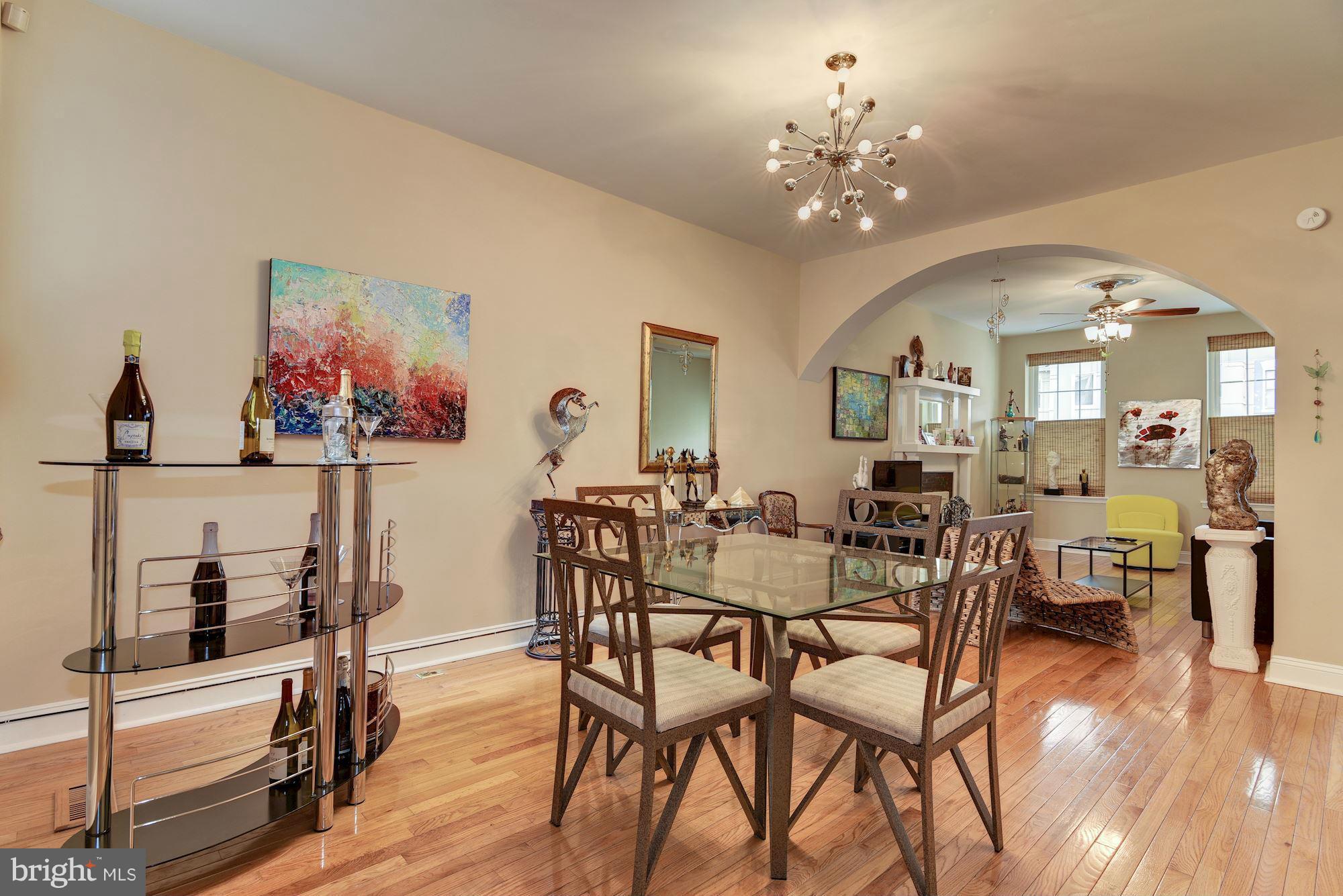 3633 13th Street Northwest Washington, DC 20010 - Photo 10 of 30 a view of a dining room with furniture and wooden floor