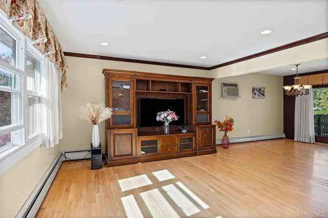 a view of a livingroom with furniture and a fireplace