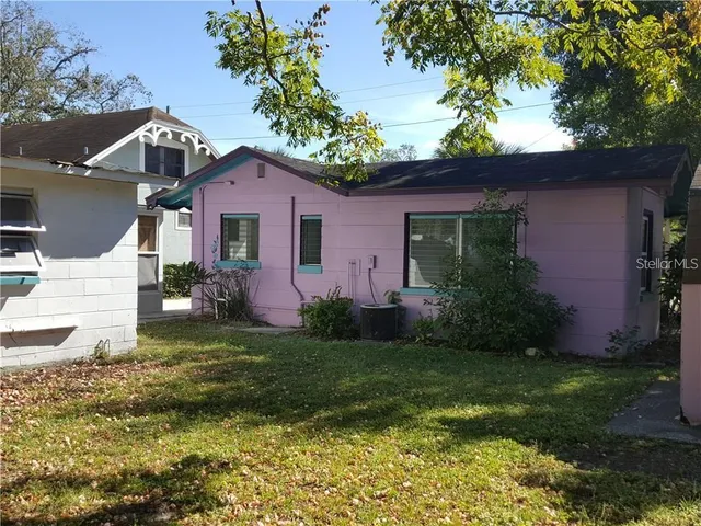 a view of a building with sitting area