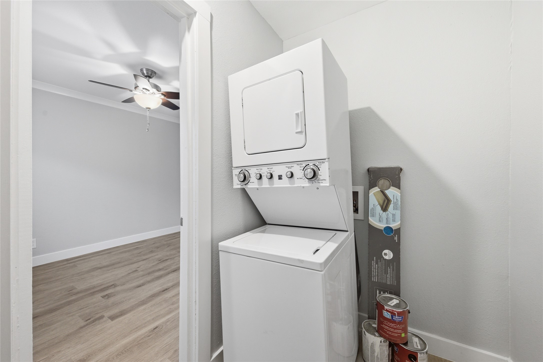 2401 Manor Road, Unit 232 Austin, TX 78722 - Photo 15 of 32 Walk in closet featuring a stacked washing machine and dryer