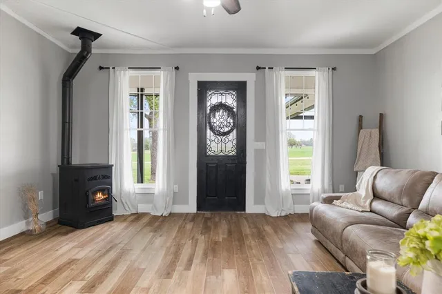 a living room with furniture and a window
