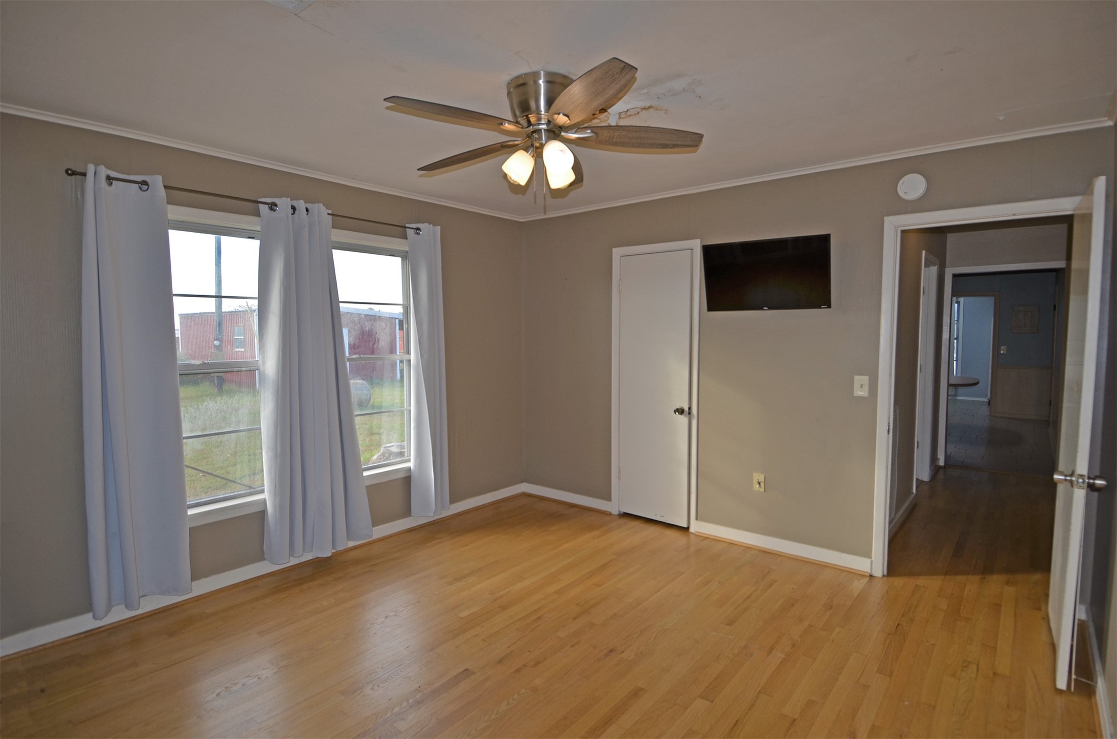 2352 Airport Road Brenham, TX 77833 - Photo 12 of 26 a view of an empty room with a window