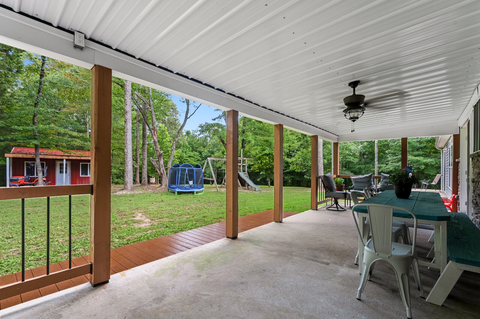 1036 North Corinth Road Portland, TN 37148 - Photo 35 of 43 a view of a porch with furniture and garden