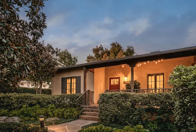 a view of a back yard from a balcony