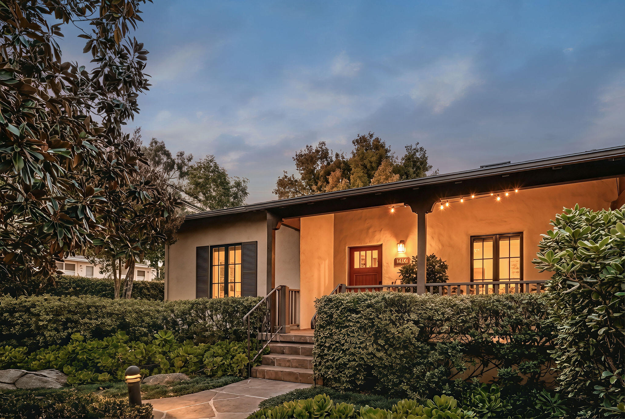 a view of a back yard from a balcony