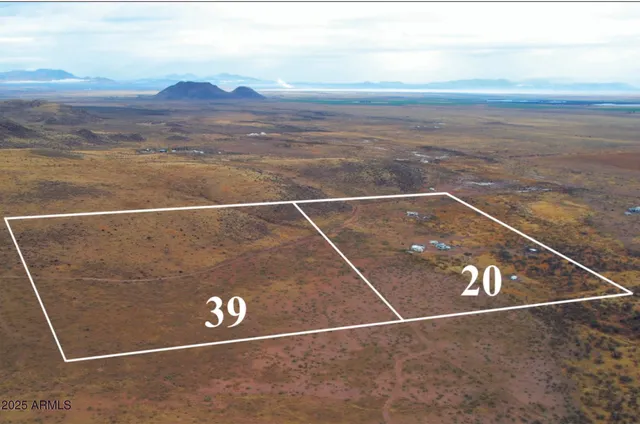 a view of a field with an outdoor space