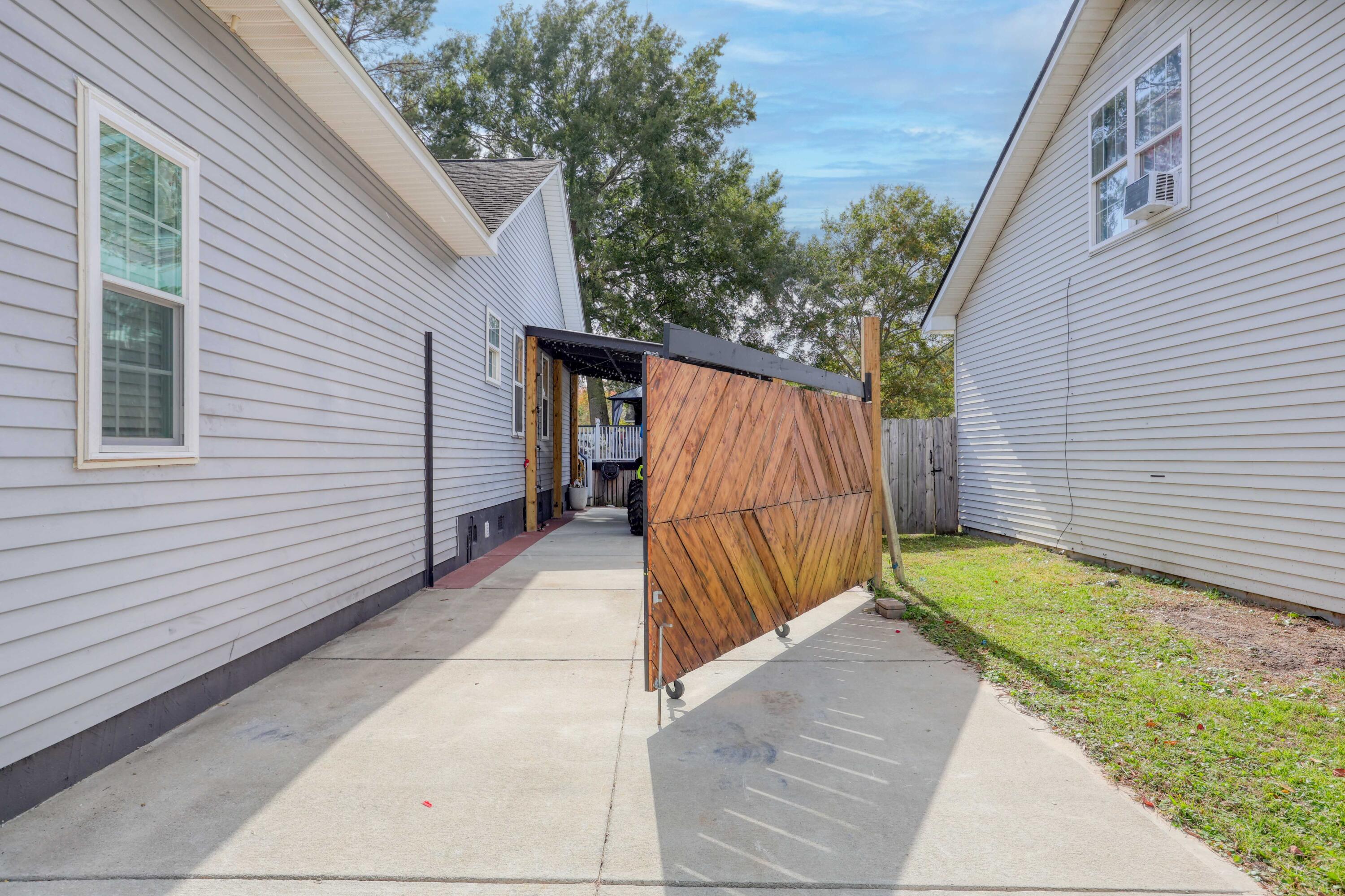 4461 Rice Mill Drive Charleston, SC 29420 - Photo 30 of 32 Driveway Gate