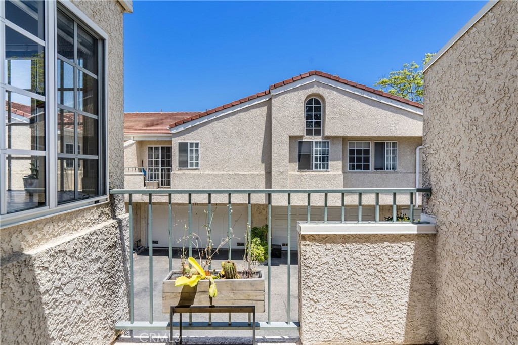 a front view of a house with swimming pool