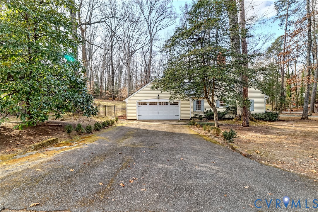 9301 Ramsgate Lane North Chesterfield, VA 23236 - Photo 36 of 42 Separate driveway to 2 car garage with storage!
