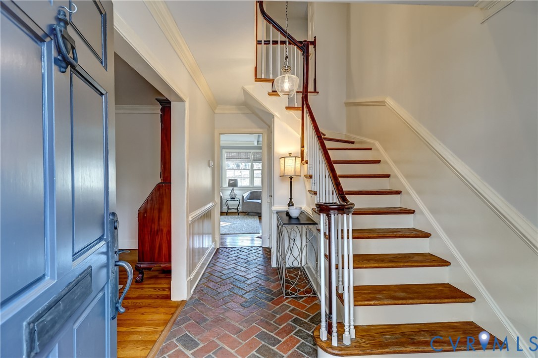 9301 Ramsgate Lane North Chesterfield, VA 23236 - Photo 4 of 42 Brick foyer with turned staircase