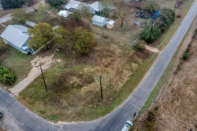 a view of a back yard of a house