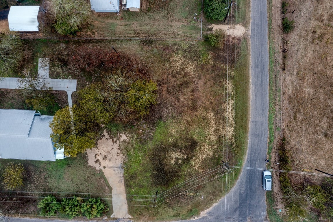 Tbd Wall Street Luling, TX 78648 - Photo 4 of 15 an aerial view of a house with a yard