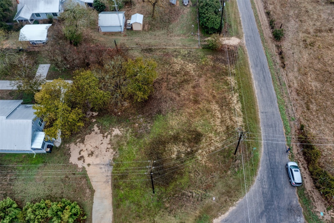 Tbd Wall Street Luling, TX 78648 - Photo 6 of 15 a backyard of a house with lots of green space
