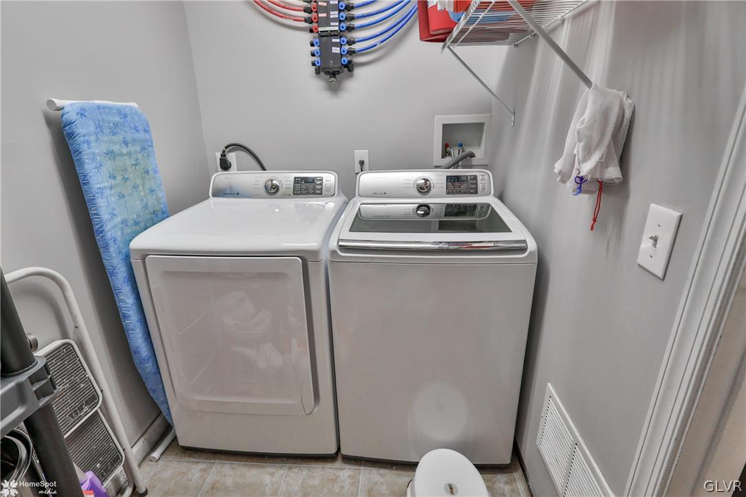 8550 Gateway Road Breinigsville, PA 18031 - Photo 11 of 50 a utility room with dryer and washer