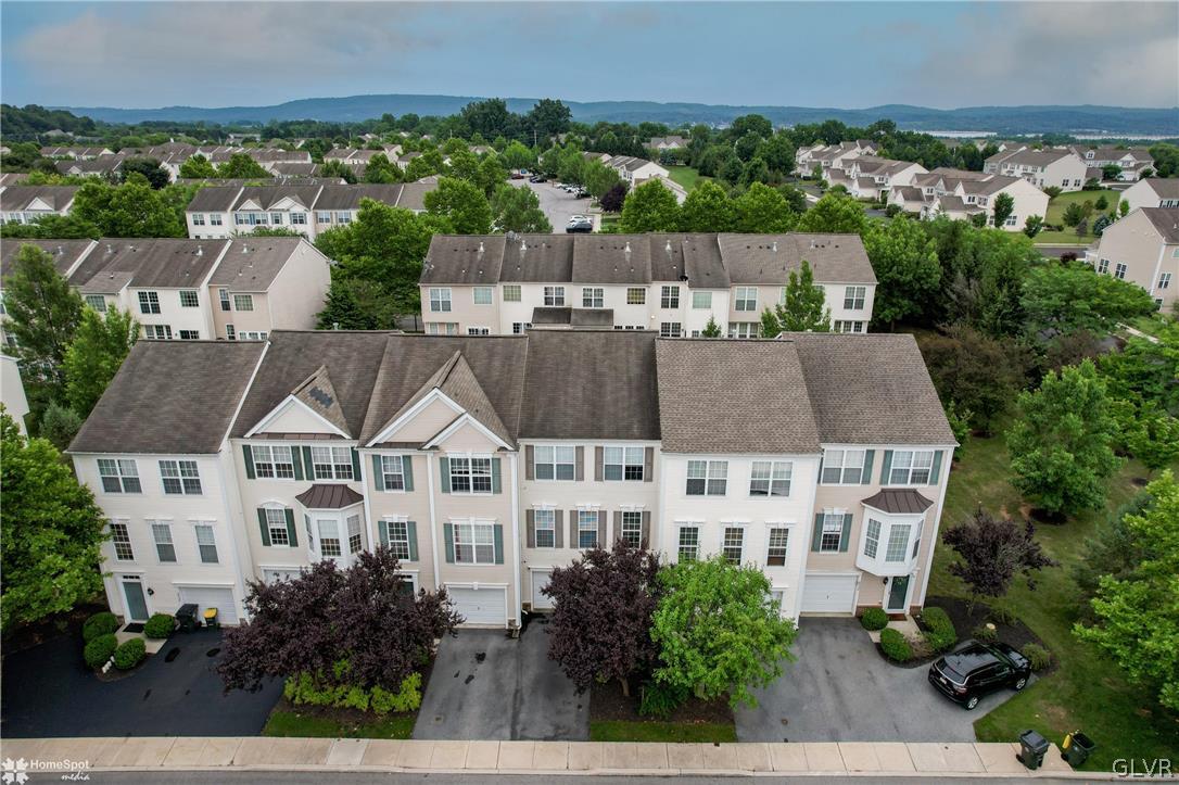 8550 Gateway Road Breinigsville, PA 18031 - Photo 2 of 50 an aerial view of residential houses with outdoor space and trees