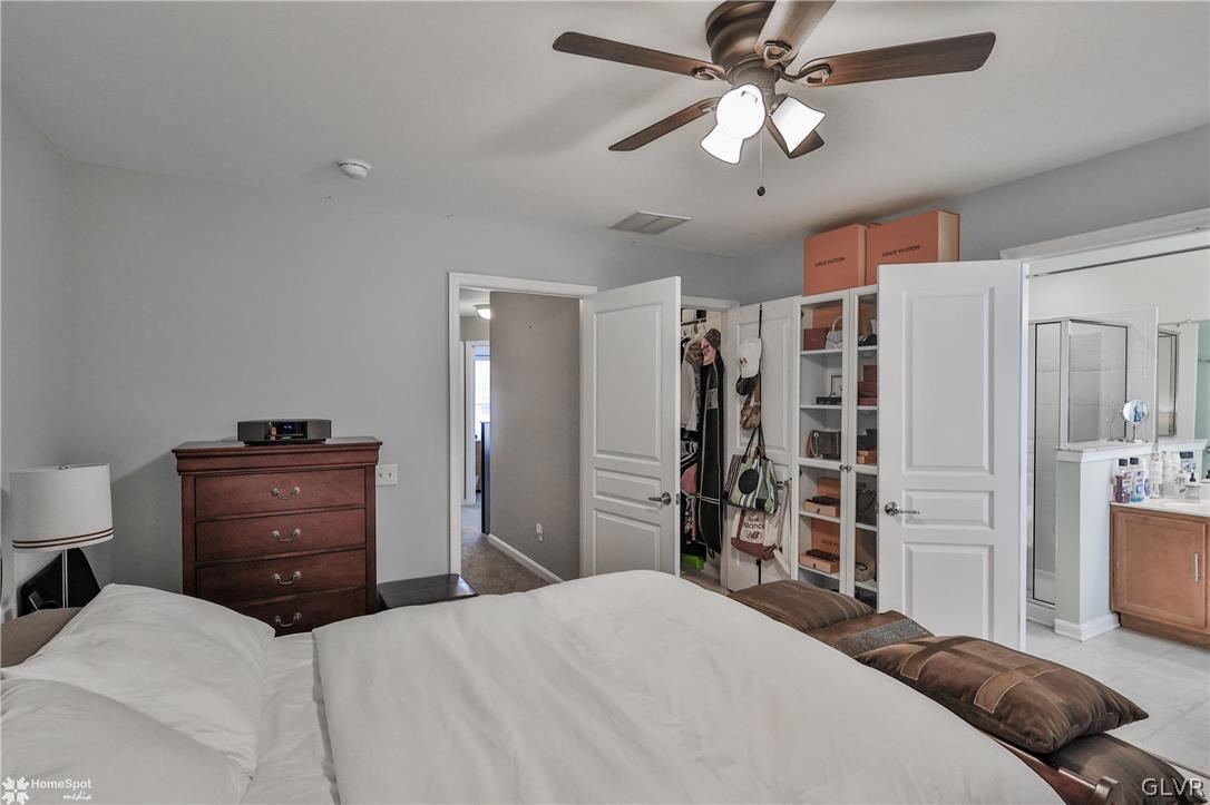 8550 Gateway Road Breinigsville, PA 18031 - Photo 34 of 50 a bedroom with a bed and a closet