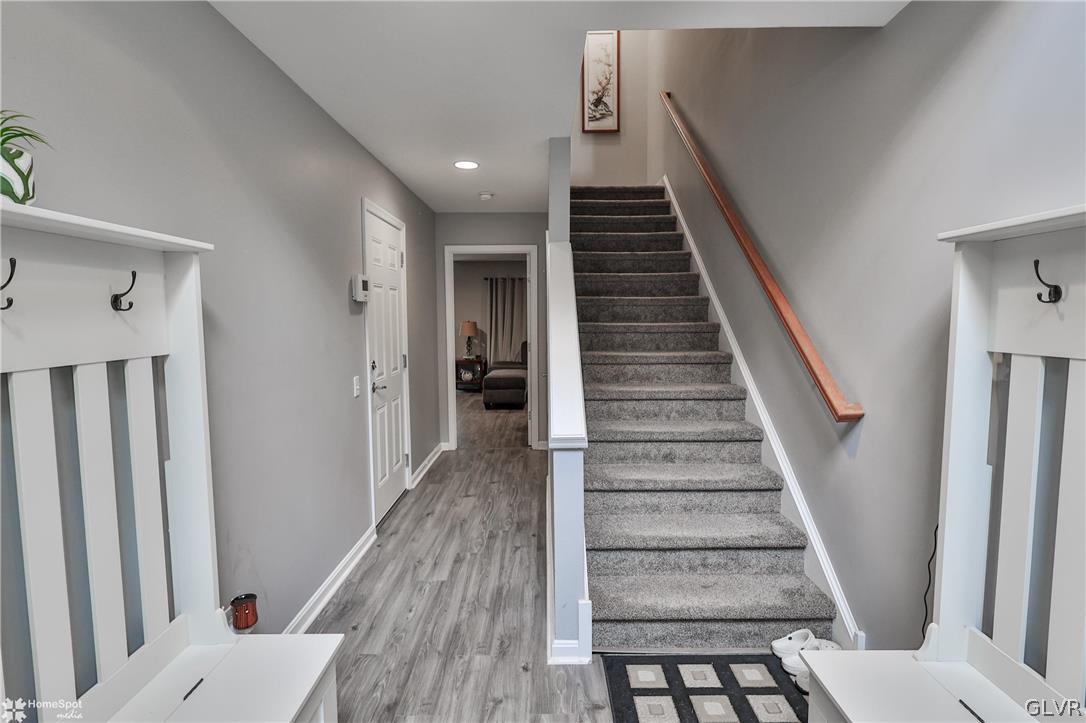 8550 Gateway Road Breinigsville, PA 18031 - Photo 5 of 50 a view of a hallway with wooden floor and entryway