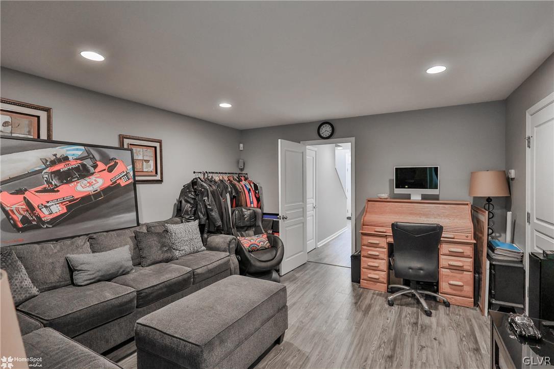 8550 Gateway Road Breinigsville, PA 18031 - Photo 10 of 50 a living room with furniture and a flat screen tv