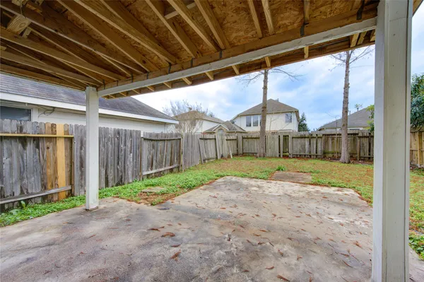 a view of a backyard of house