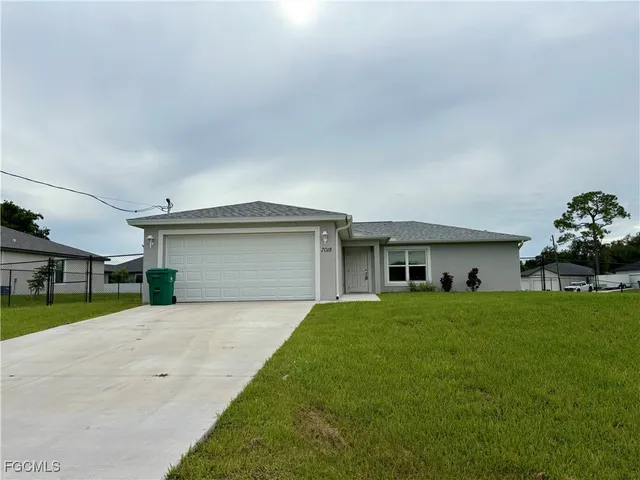 a house view with a garden space