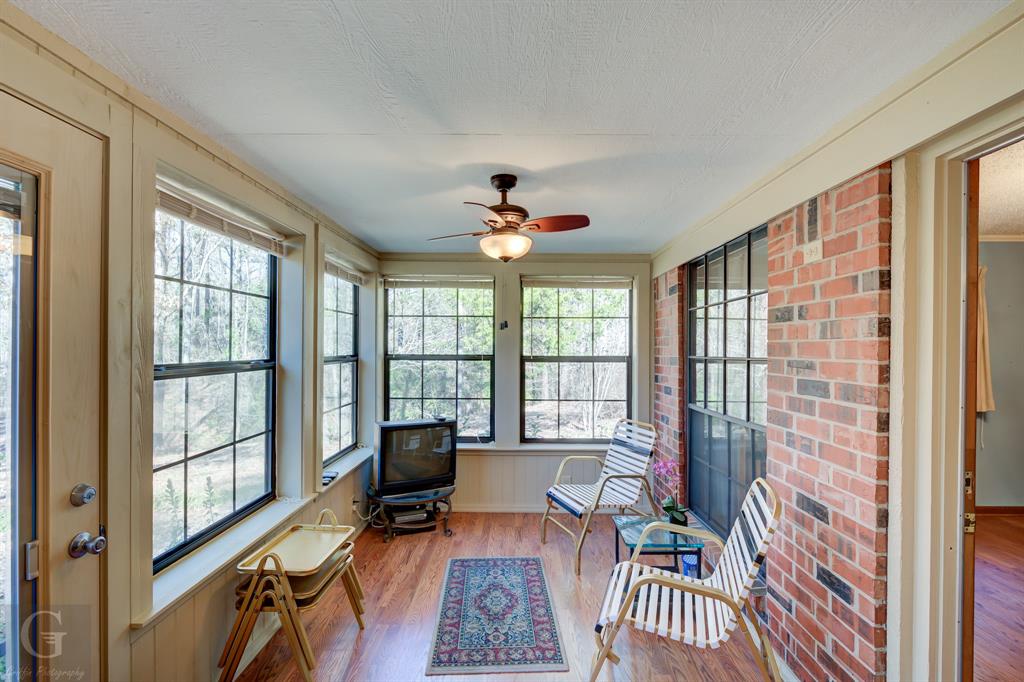 7105 Rodessa Ida Road Ida, LA 71044 - Photo 11 of 40 a living room with furniture and a window