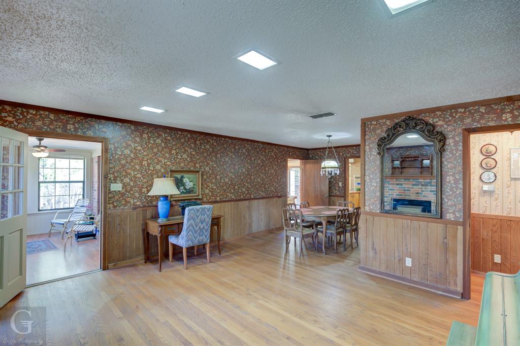 7105 Rodessa Ida Road Ida, LA 71044 - Photo 12 of 40 a view of a dining room with furniture and wooden floor