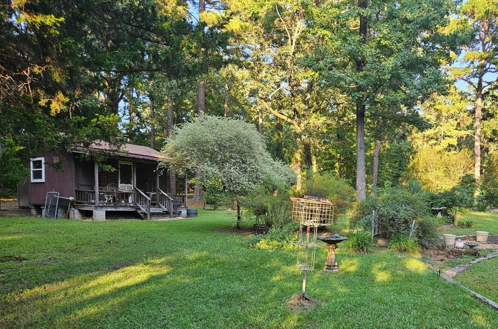 7105 Rodessa Ida Road Ida, LA 71044 - Photo 20 of 40 a view of a chairs in a backyard