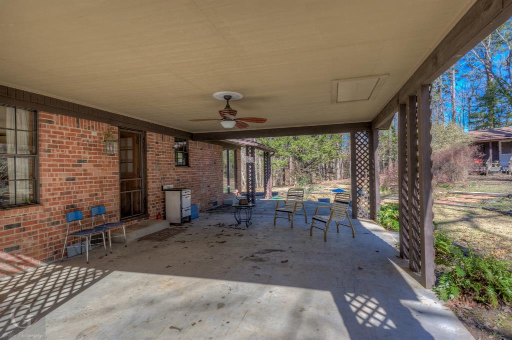 7105 Rodessa Ida Road Ida, LA 71044 - Photo 3 of 40 a view of a dining room with furniture window and outside view