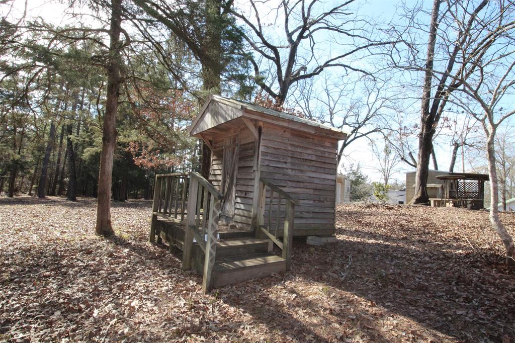 7105 Rodessa Ida Road Ida, LA 71044 - Photo 35 of 40 a view of a house with a yard