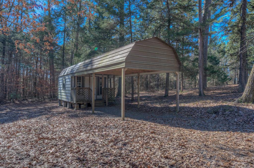 7105 Rodessa Ida Road Ida, LA 71044 - Photo 36 of 40 a backyard of a house with seating space