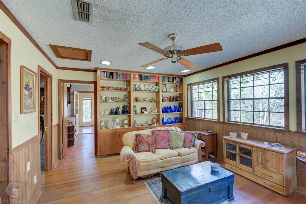 7105 Rodessa Ida Road Ida, LA 71044 - Photo 8 of 40 a living room with furniture and a ceiling fan
