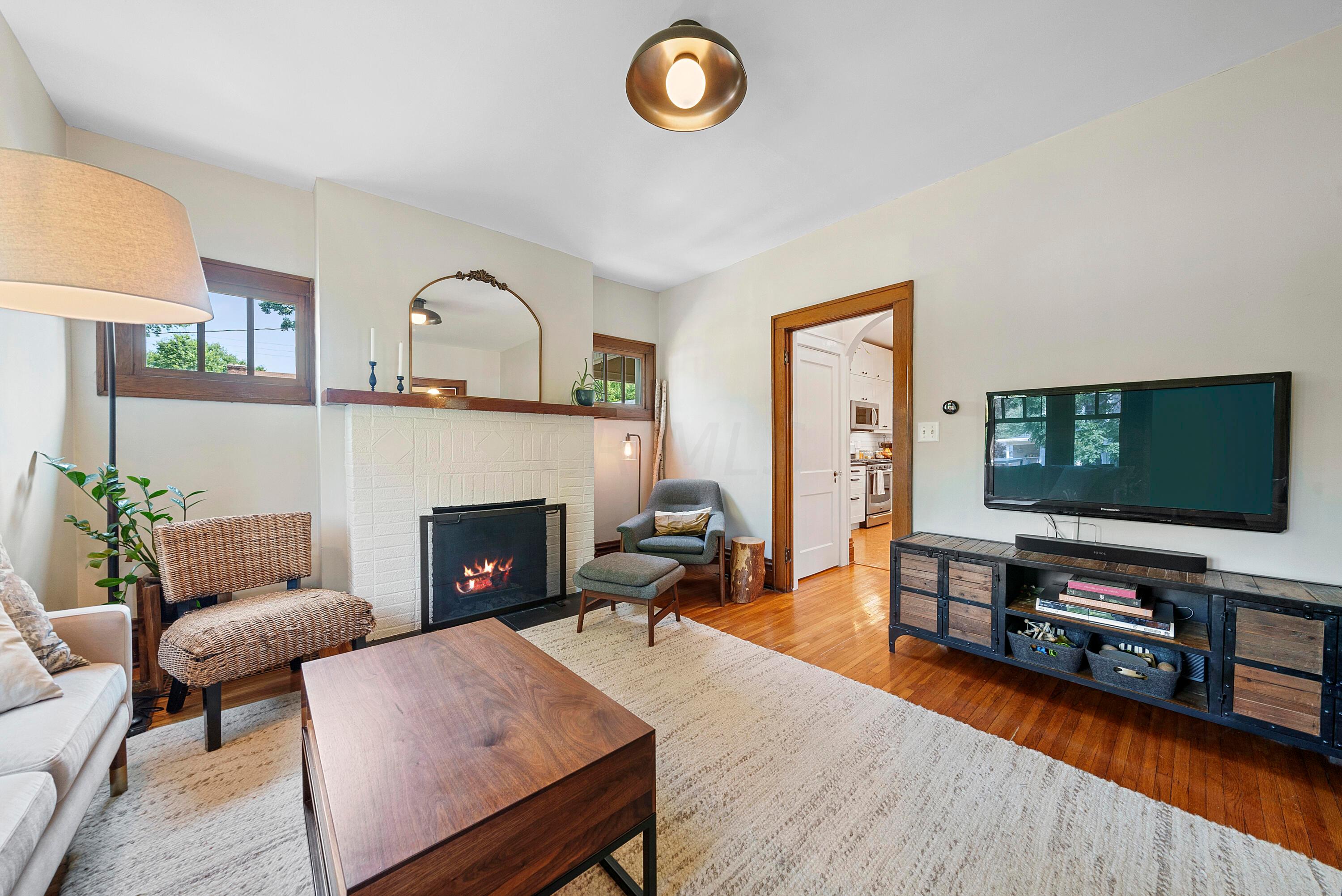116 Fallis Road Columbus, OH 43214 - Photo 8 of 61 Gas fireplace w/ brick surround.