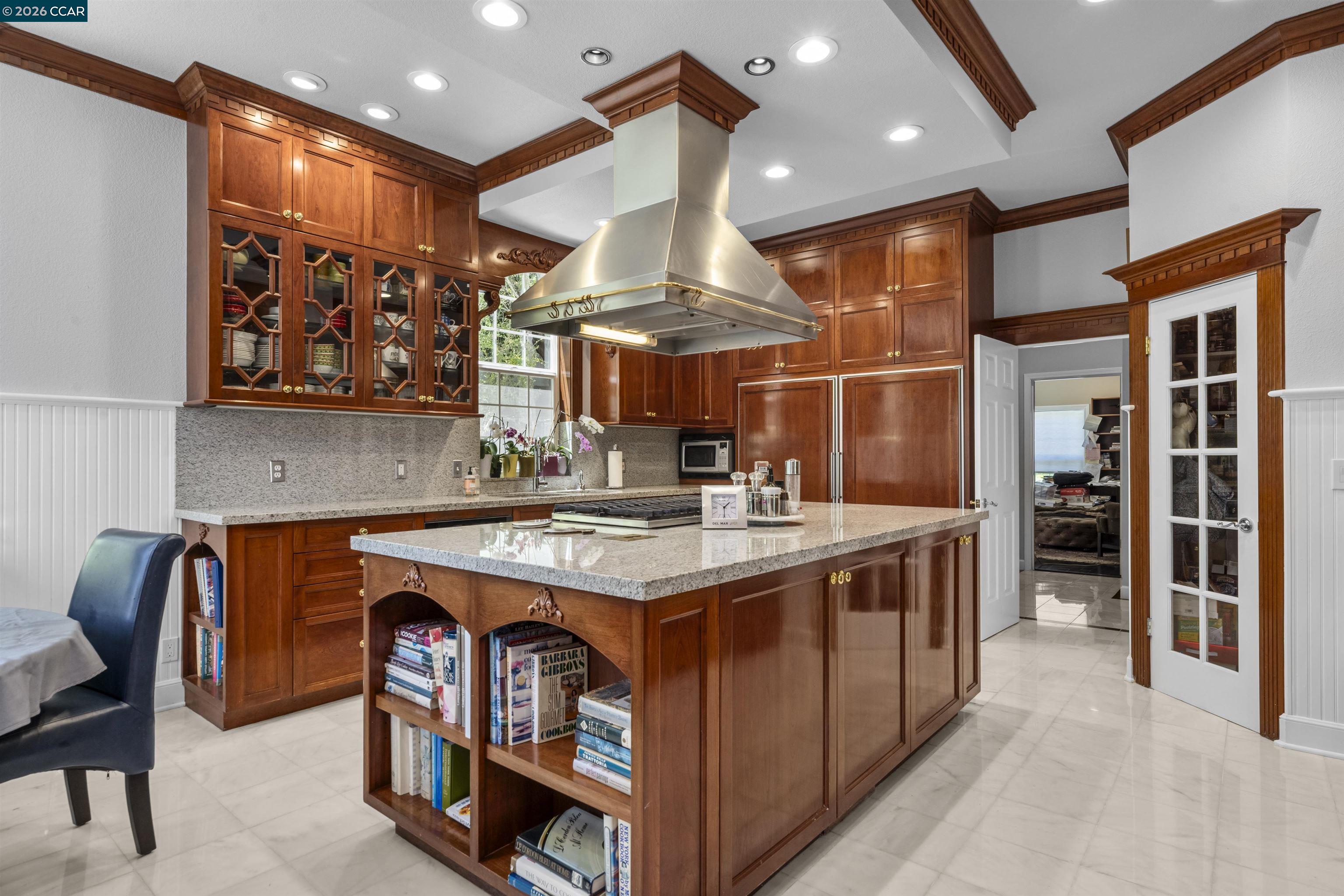 177 Oak Road Alamo, CA 94507 - Photo 11 of 85 a kitchen with stainless steel appliances granite countertop a stove and a refrigerator