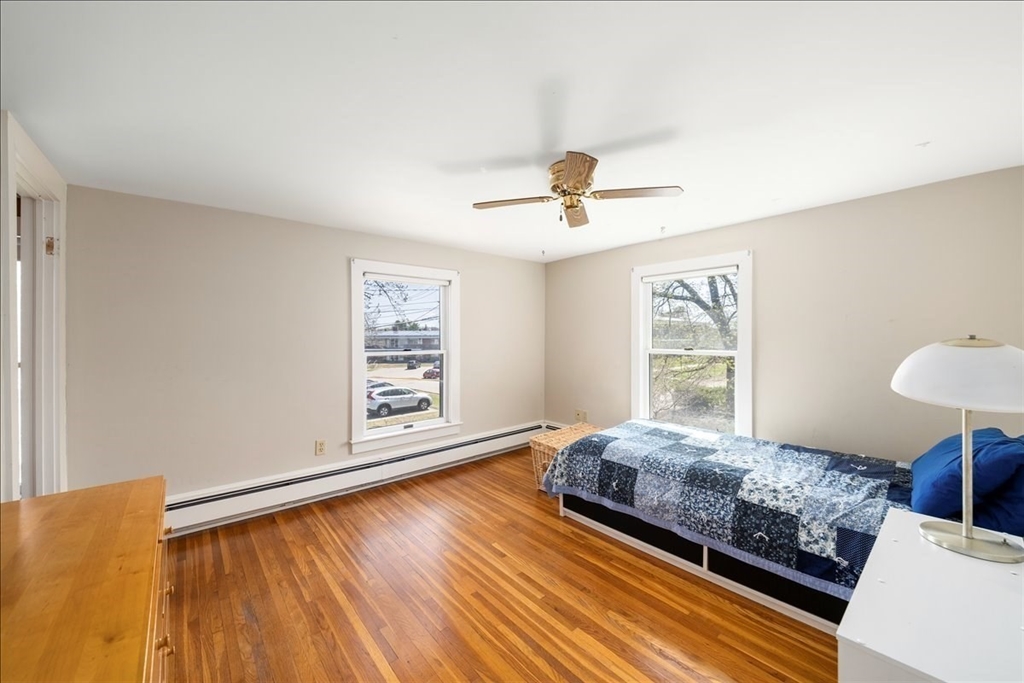 10 2nd Street Natick, MA 01760 - Photo 14 of 31 a bedroom with a bed and a window