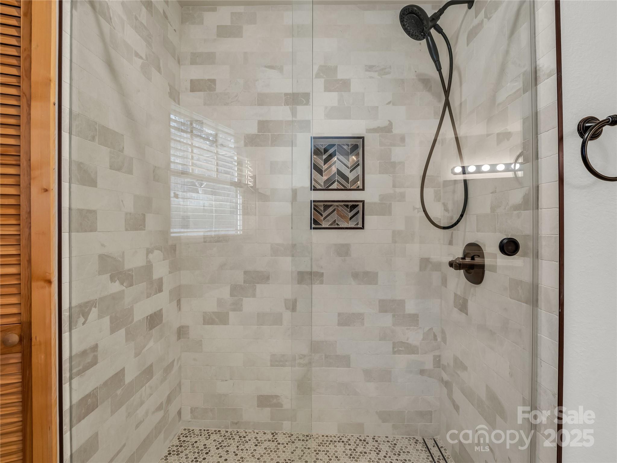 134 Raleigh Drive Lake Lure, NC 28746 - Photo 16 of 45 a bathroom with a shower