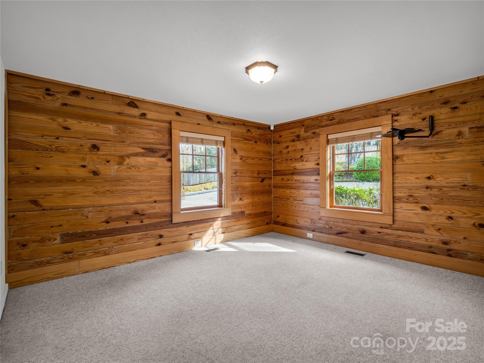 134 Raleigh Drive Lake Lure, NC 28746 - Photo 19 of 45 a view of an empty room with a window
