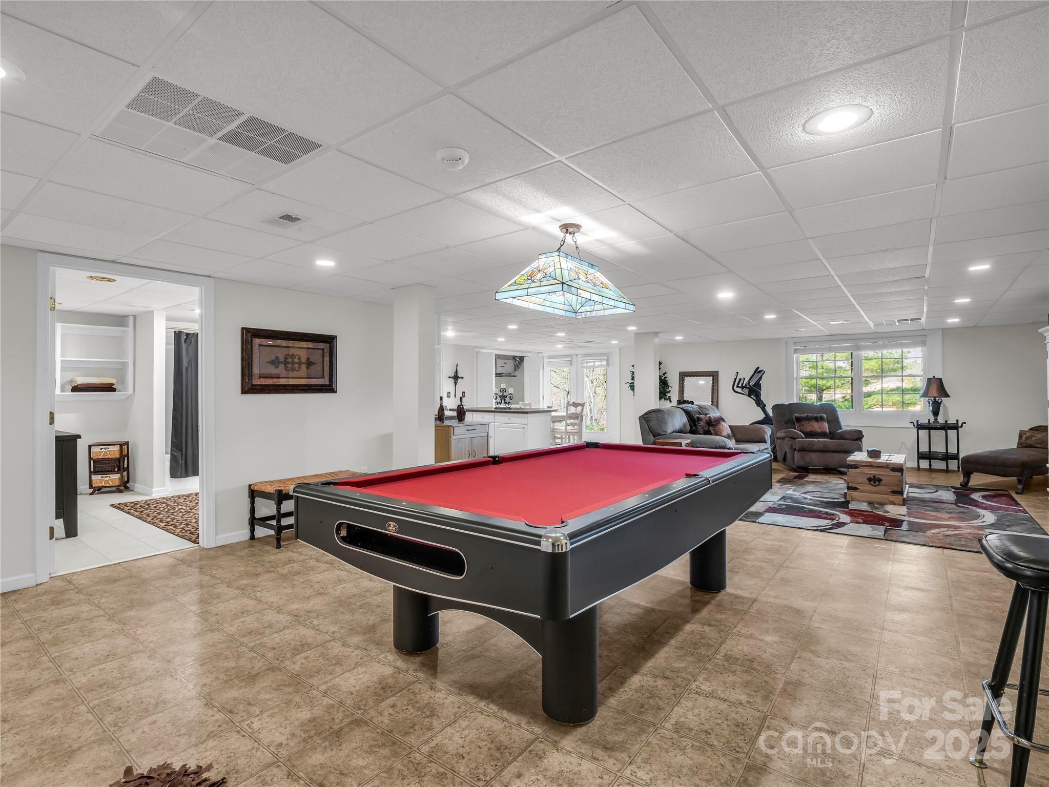 134 Raleigh Drive Lake Lure, NC 28746 - Photo 29 of 45 a room with pool table and windows
