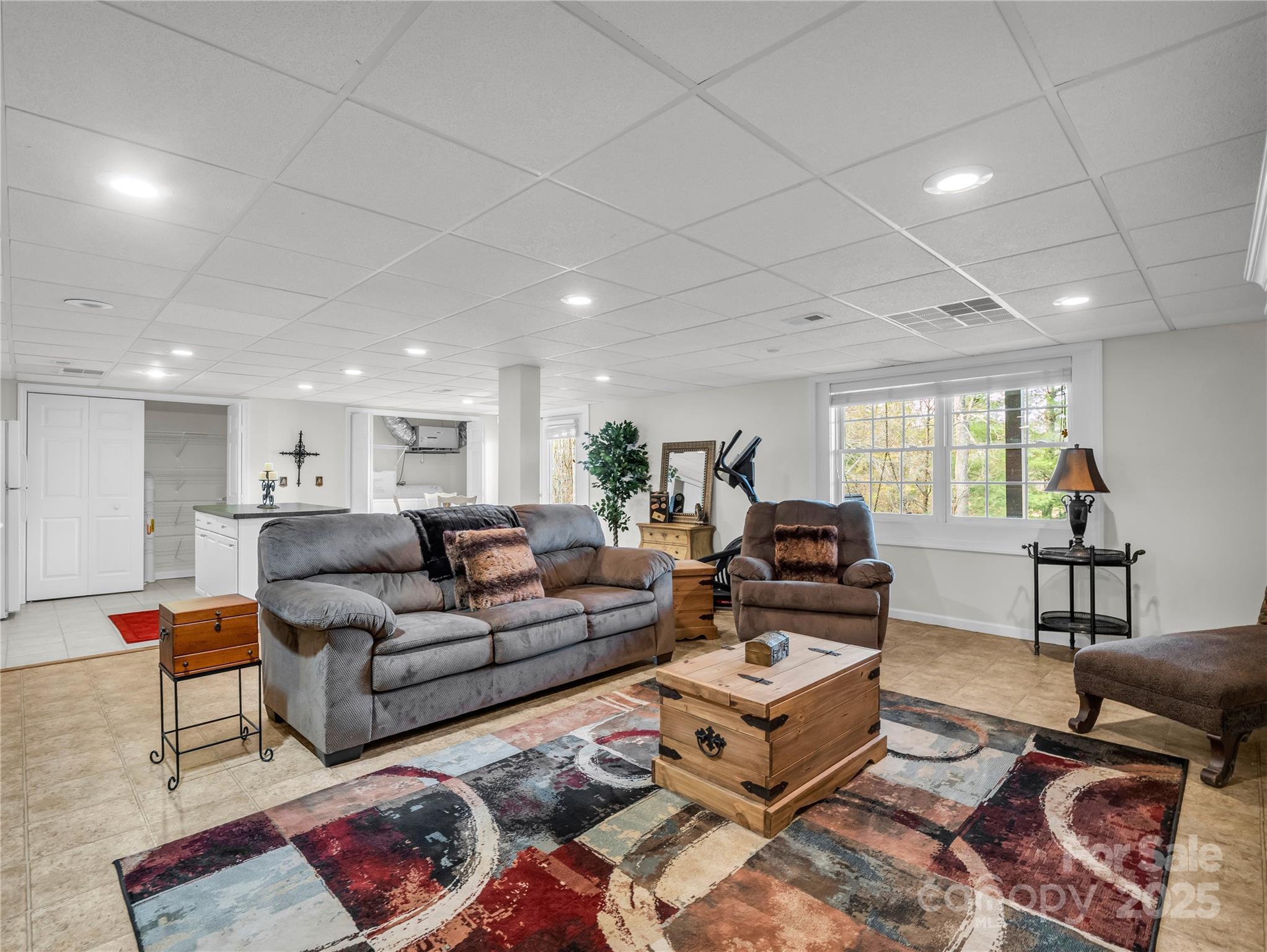 134 Raleigh Drive Lake Lure, NC 28746 - Photo 30 of 45 a living room with furniture and a wooden floor