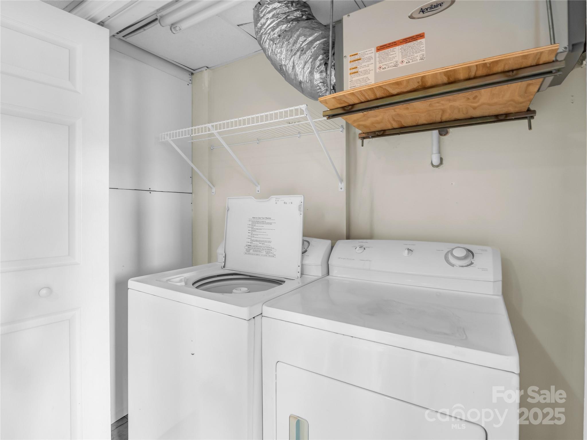 134 Raleigh Drive Lake Lure, NC 28746 - Photo 32 of 45 a utility room with dryer and washer