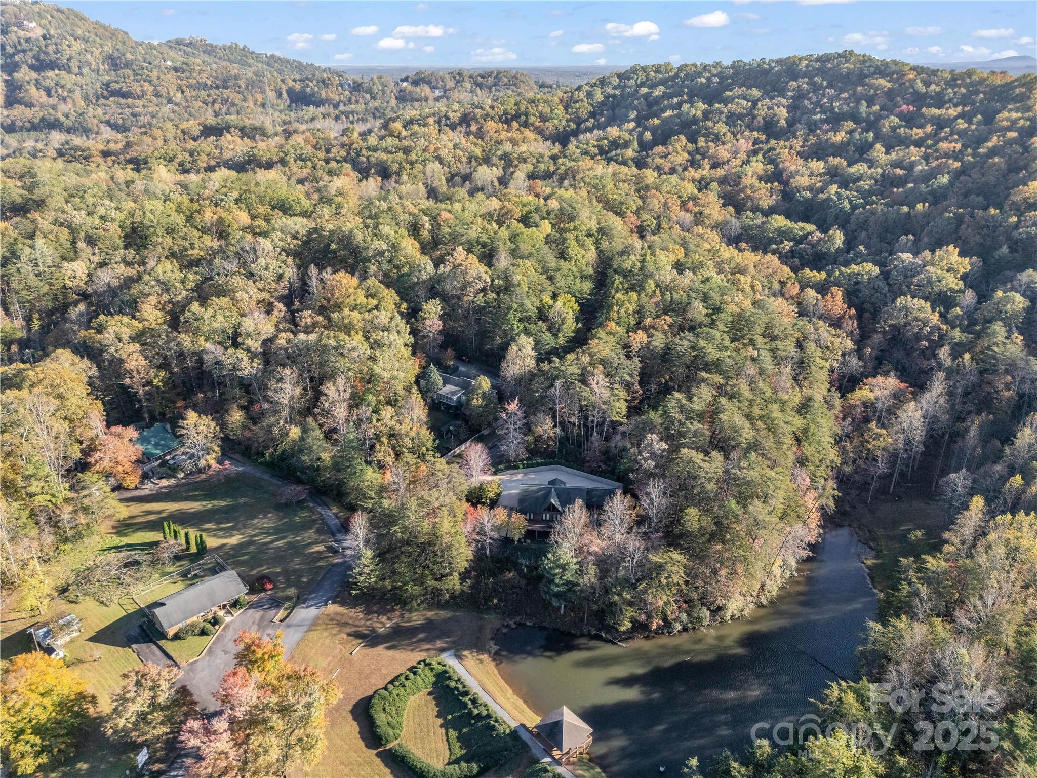 134 Raleigh Drive Lake Lure, NC 28746 - Photo 41 of 45 an aerial view of residential houses with outdoor space
