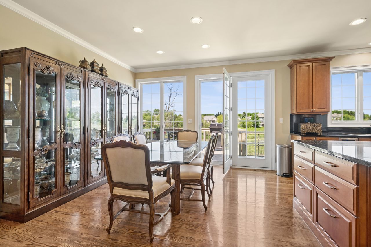 1029 Ridgeview Drive Inverness, IL 60010 - Photo 18 of 58 a view of a a dining room with furniture window and wooden floor