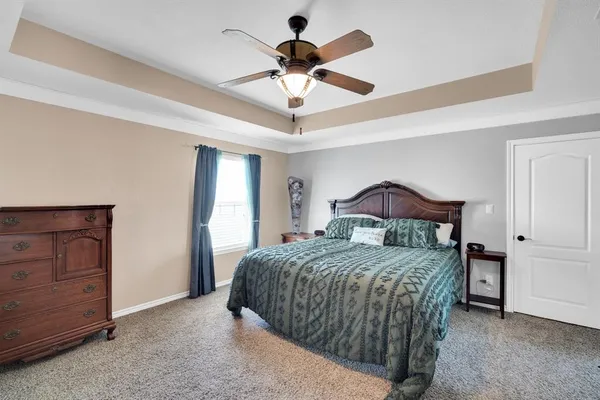 a bathroom with a double vanity sink and mirror