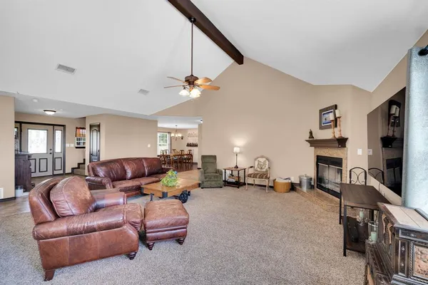 a kitchen with refrigerator cabinets and wooden floor