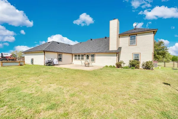 a view of a terrace with chairs