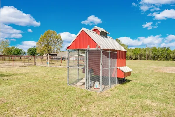 an empty room with a empty space and windows