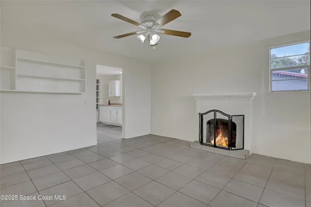 a view of an empty room and window